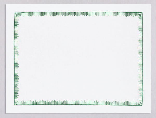 White linen placemat and napkin set embroidered with green mikado motif border, 100% European linen, handcrafted by Plein Soleil.