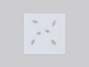 White linen cocktail napkin set embroidered with gold and silver small leaves, 100% European linen, handcrafted by Plein Soleil.