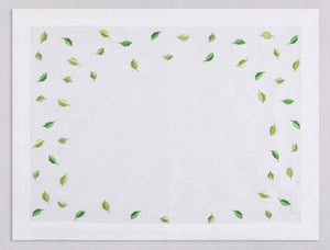 White linen placemat and napkin set embroidered with green small leaves, 100% European linen, handcrafted by Plein Soleil.