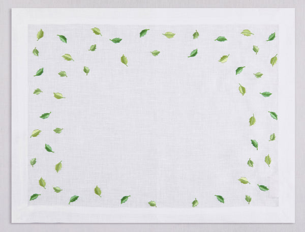 White linen placemat and napkin set embroidered with green small leaves, 100% European linen, handcrafted by Plein Soleil.