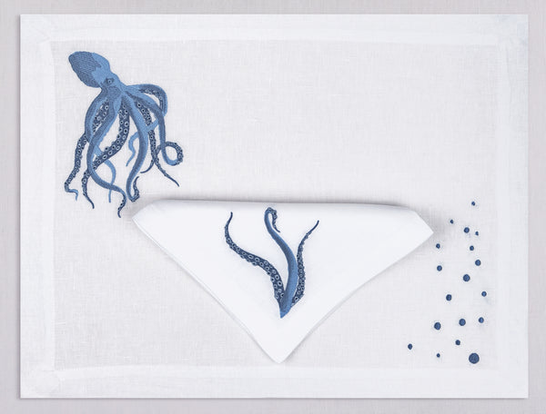 White linen placemat and napkin set embroidered with a blue octopus, 100% European linen, handcrafted by Plein Soleil.