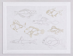 White linen placemat and napkin set embroidered with gold and silver outline fish, 100% European linen, handcrafted by Plein Soleil.