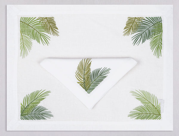White linen placemat and napkin set embroidered with green palm branches, 100% European linen, handcrafted by Plein Soleil.