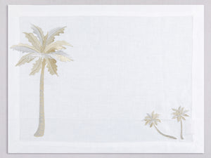White linen placemat and napkin set embroidered with gold and silver palm trees, 100% European linen, handcrafted by Plein Soleil.
