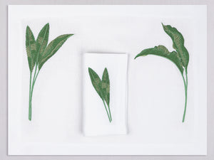 White linen placemat and napkin set embroidered with green banana leaves, 100% European linen, handcrafted by Plein Soleil.
