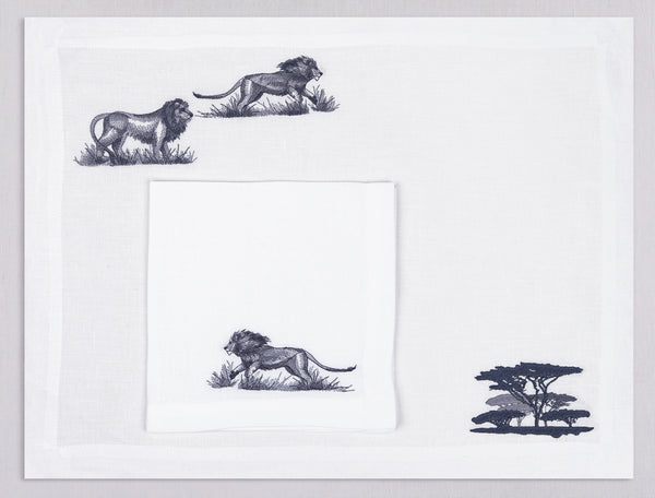 White linen placemat and napkin set embroidered with lions and safari trees, 100% European linen, handcrafted by Plein Soleil.