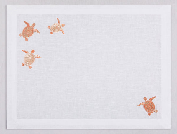 White linen placemat and napkin set embroidered with salmon sea turtles, 100% European linen, handcrafted by Plein Soleil.