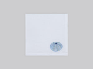 White linen cocktail napkin set embroidered with ice blue sea urchin, 100% European linen, handcrafted by Plein Soleil.