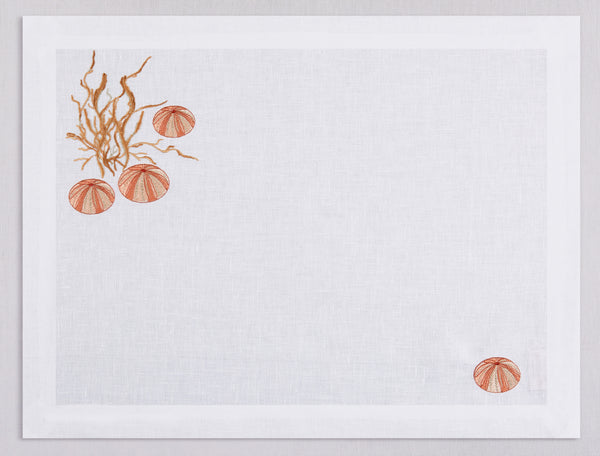 White linen placemat and napkin set embroidered with orange sea urchin and seaweed, 100% European linen, handcrafted by Plein Soleil.