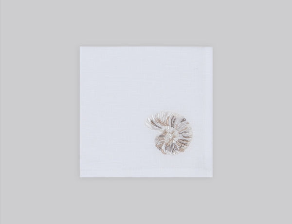 White linen cocktail napkin embroidered with ivory shell, 100% European linen, handcrafted by Plein Soleil.