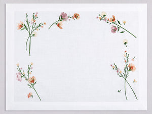 White linen placemat and napkin set embroidered with dark pink flowers, 100% European linen, handcrafted by Plein Soleil.