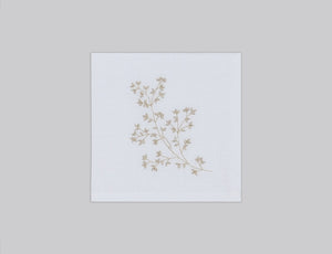 White linen cocktail napkin set embroidered with gold spring branches, 100% European linen, handcrafted by Plein Soleil.