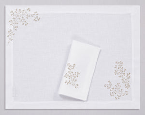 White linen placemat and napkin set embroidered with gold spring branches, 100% European linen, handcrafted by Plein Soleil.