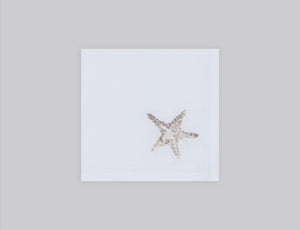 White linen cocktail napkin embroidered with ivory starfish, 100% European linen, handcrafted by Plein Soleil.