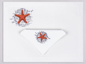 White linen placemat and napkin set embroidered with orange starfish and poem, 100% European linen, handcrafted by Plein Soleil.
