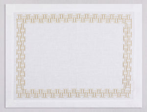 White linen placemat and napkin set embroidered with gold versa geometric border, 100% European linen, handcrafted by Plein Soleil.