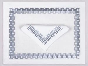 White linen placemat and napkin set embroidered with gray versa geometric border, 100% European linen, handcrafted by Plein Soleil.