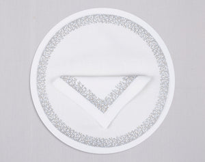 White round linen placemat and napkin set embroidered with silver waterfall motif border, 100% European linen, handcrafted by Plein Soleil.